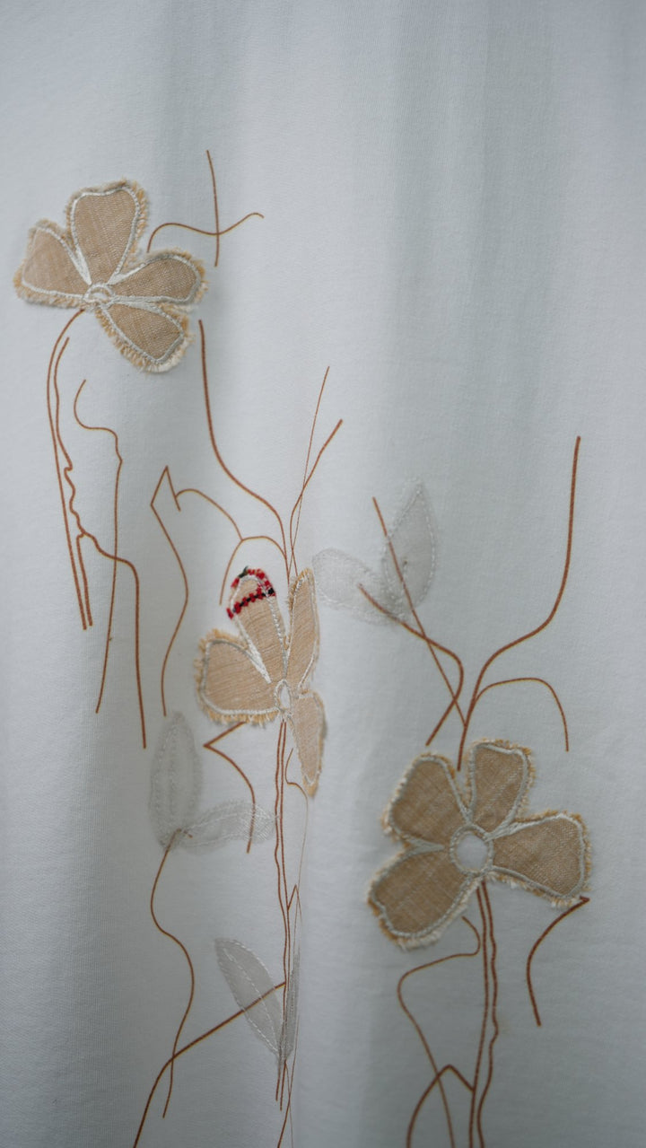 Ahimsa 02 — blossom appliqué detail