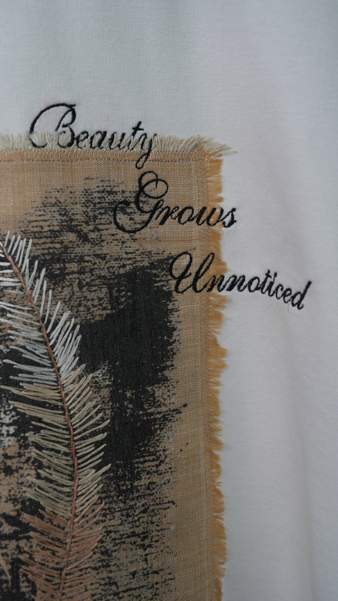 Ahimsa 03 — embroidered script detail