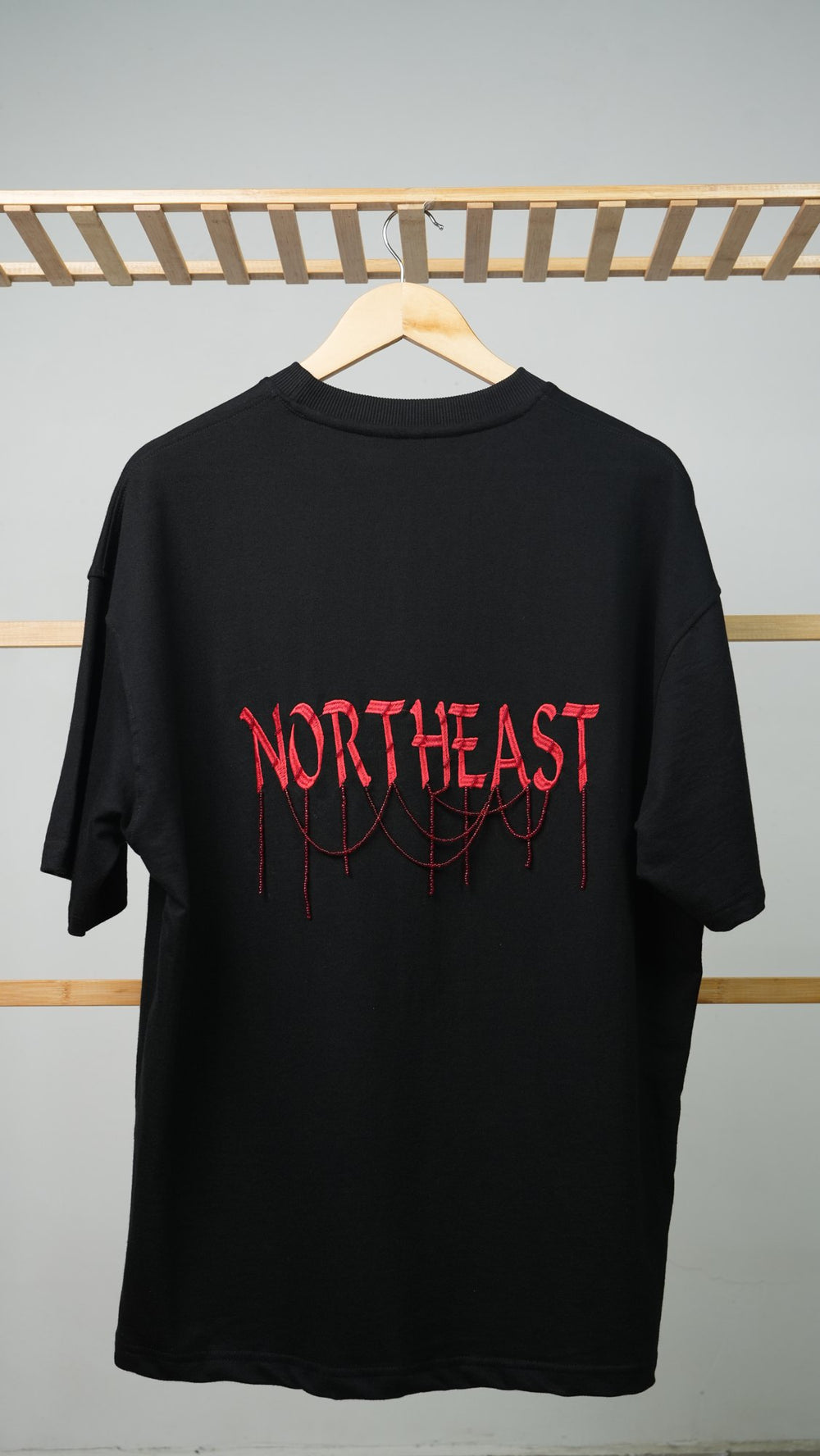 Ahimsa 04 — back, NORTHEAST thread-drip embroidery