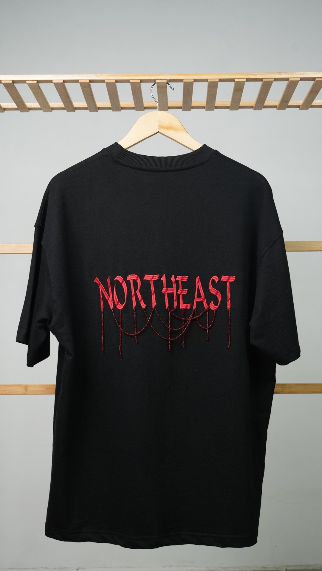 Ahimsa 04 — back, NORTHEAST thread-drip embroidery